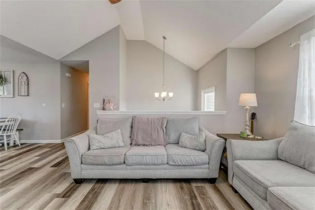 a living room with furniture and a couch
