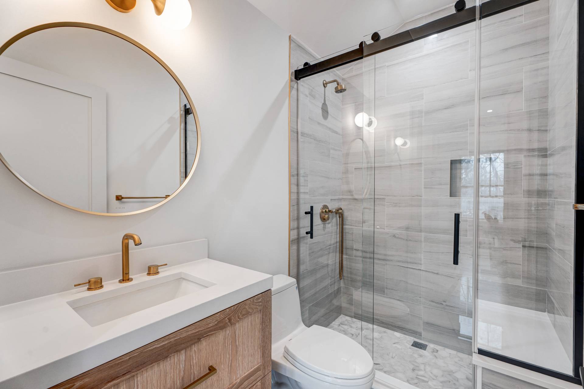 93 South Country Road Remsenburg, NY 11960 - Photo 16 of 27 a bathroom with a sink a toilet and shower
