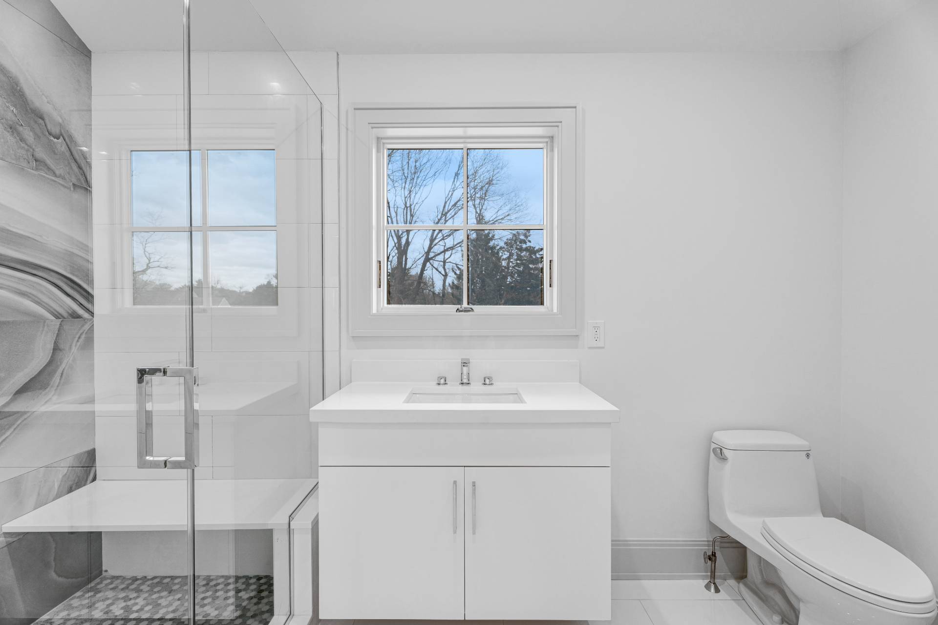 93 South Country Road Remsenburg, NY 11960 - Photo 23 of 27 a bathroom with a toilet sink and mirror