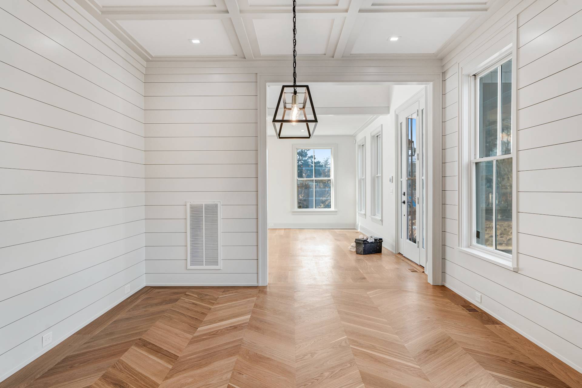 93 South Country Road Remsenburg, NY 11960 - Photo 3 of 27 a view of empty room with wooden floor and fan