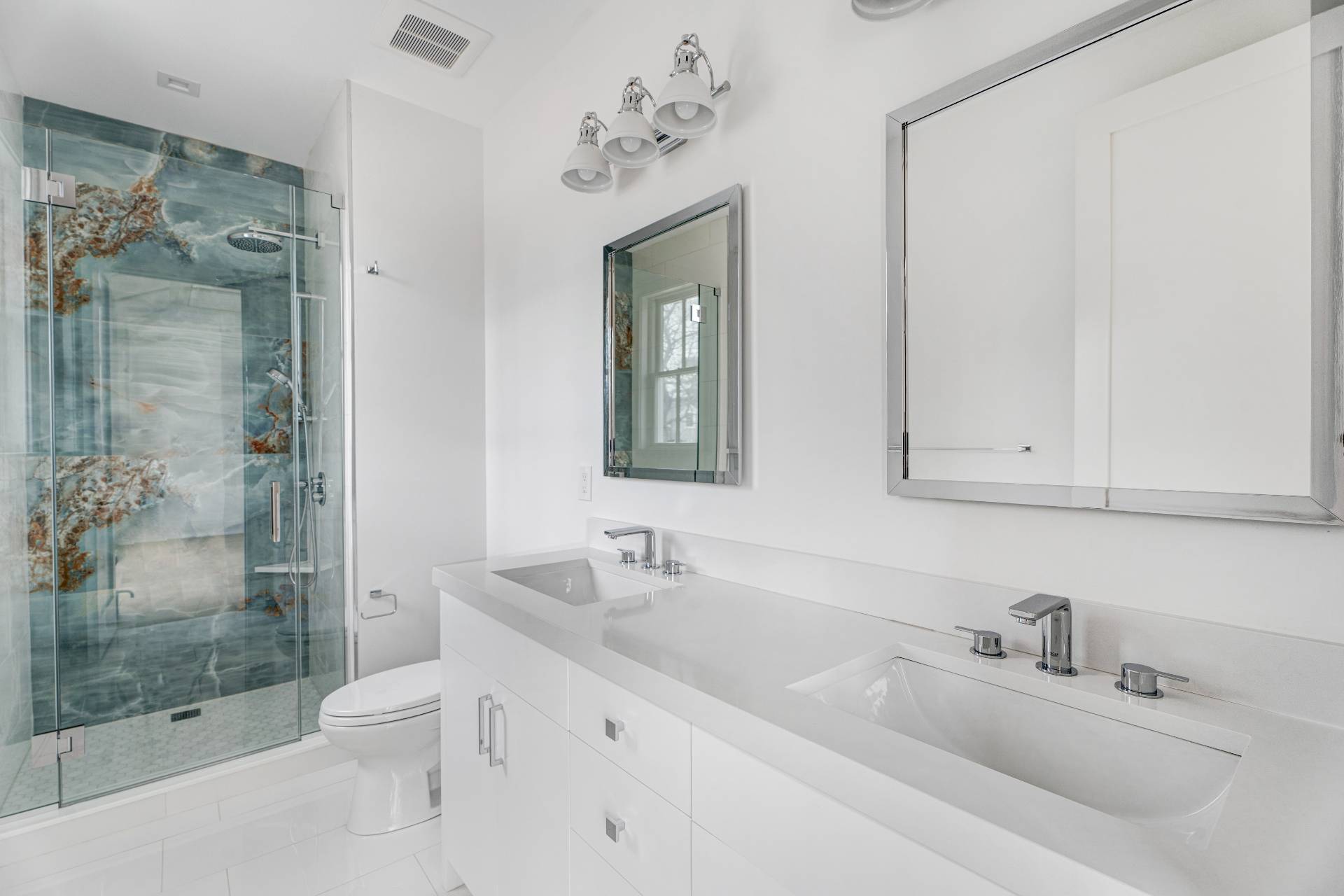 93 South Country Road Remsenburg, NY 11960 - Photo 8 of 27 a bathroom with a sink a toilet and shower
