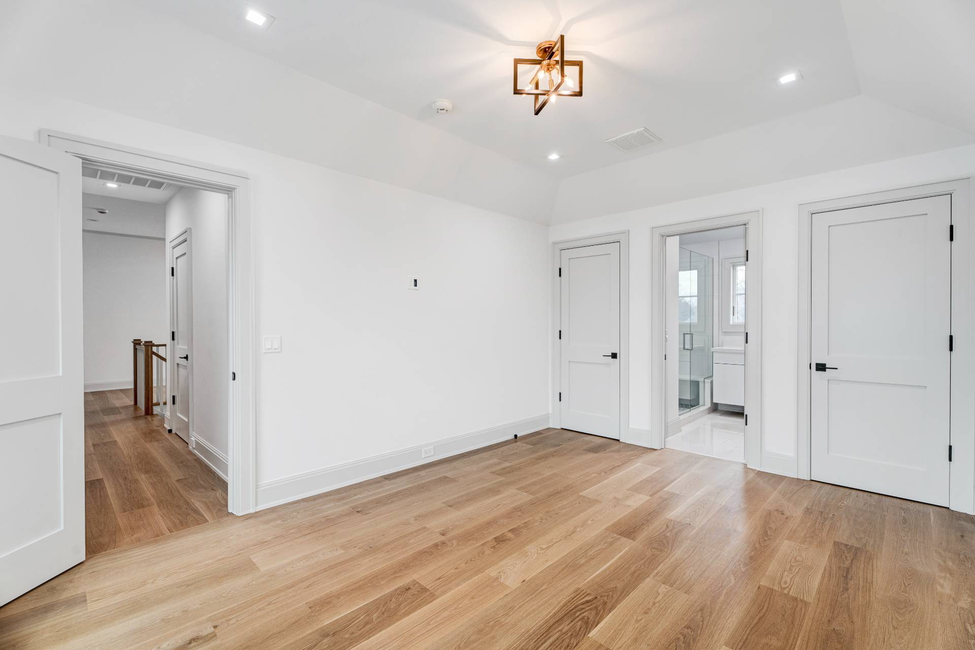 93 South Country Road Remsenburg, NY 11960 - Photo 9 of 27 wooden floor in an empty room with a window