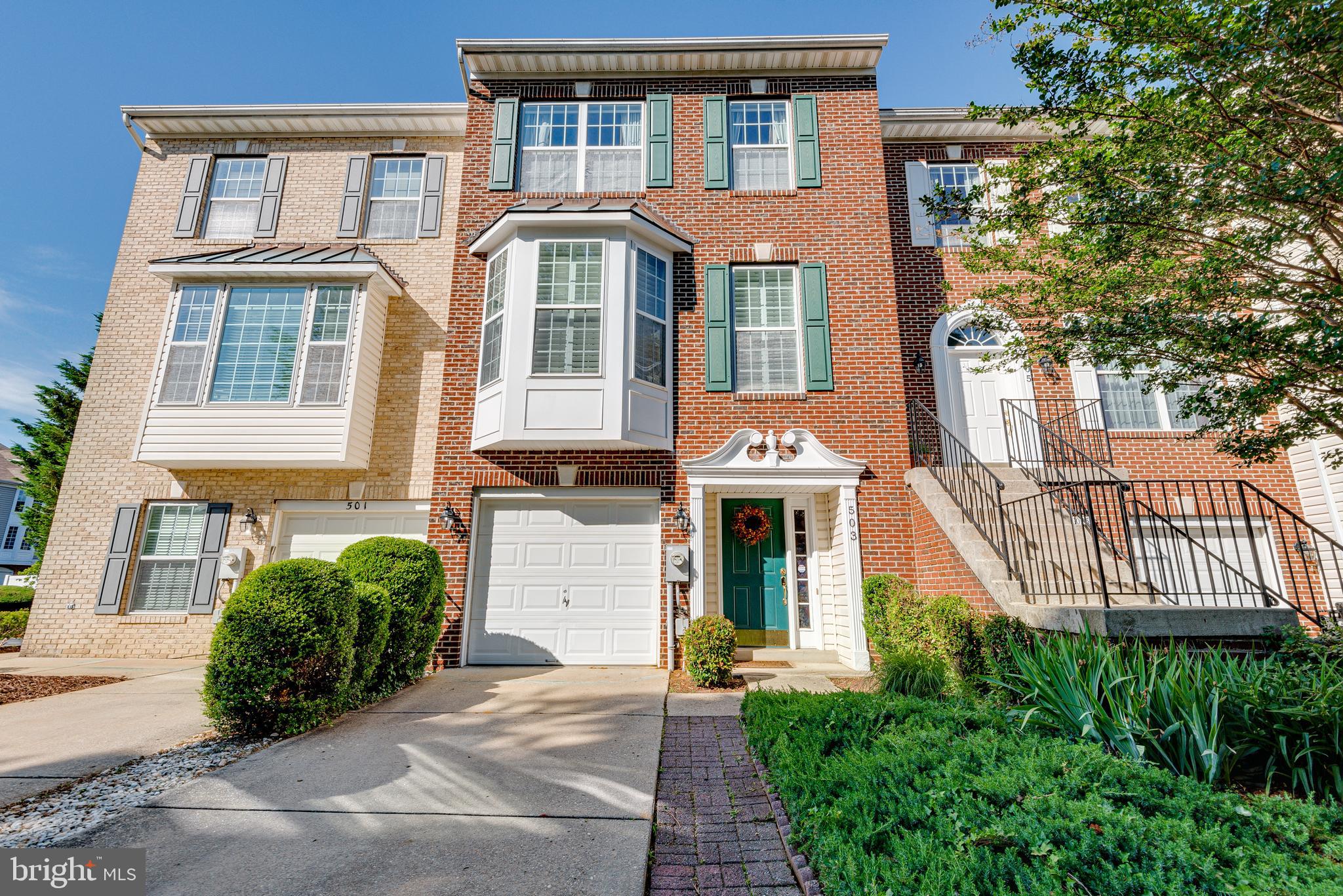 503 Captain John Brice Way, Unit 503 Annapolis, MD 21401 - Photo 1 of 45 a front view of a house with a yard