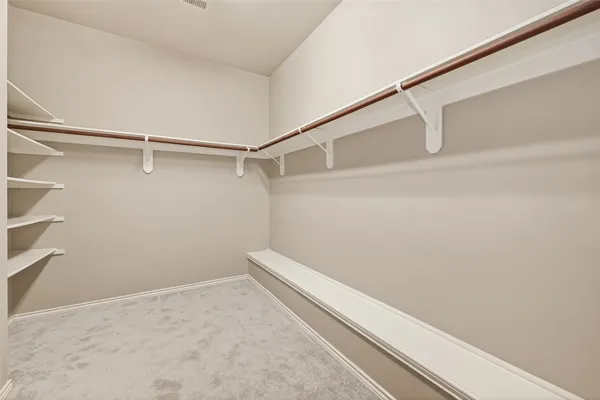 a view of small space with racks on the wall