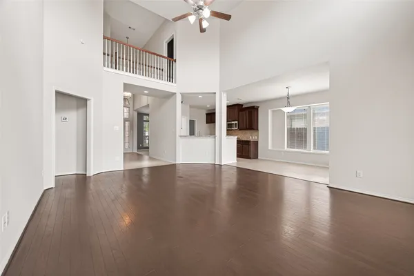 a view of an entryway with wooden floor