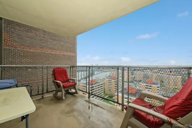 a balcony with chairs