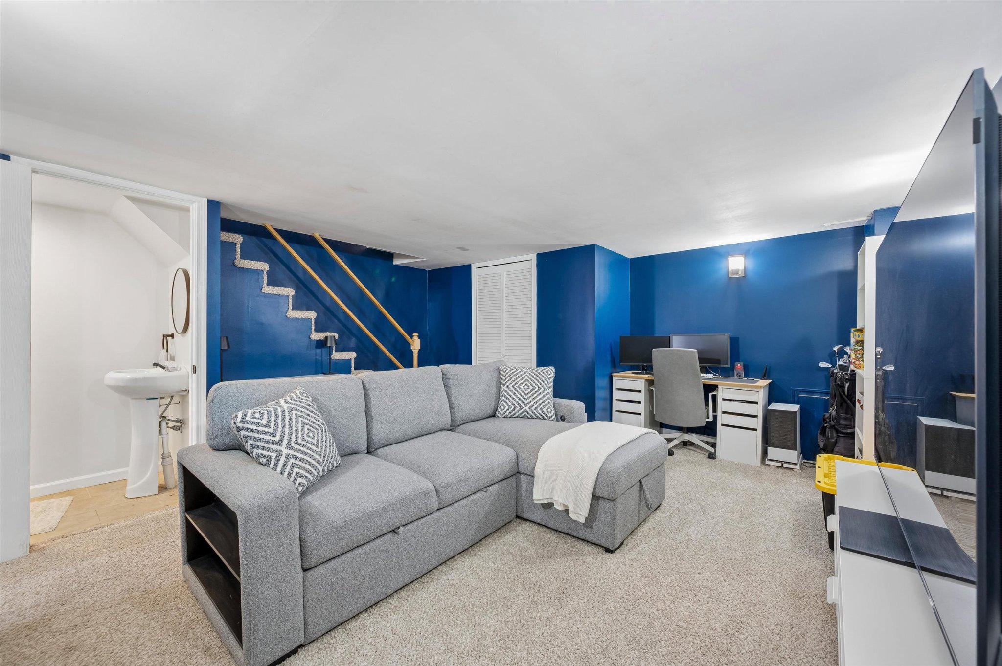 6640 Lotus Road Philadelphia, PA 19151 - Photo 11 of 12 Cozy lower-level retreat with modern flair.