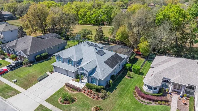 an aerial view of a house with garden
