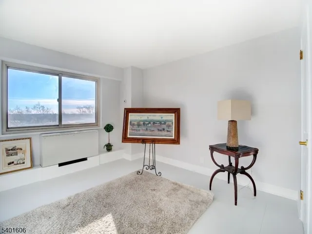 a room with furniture and a window