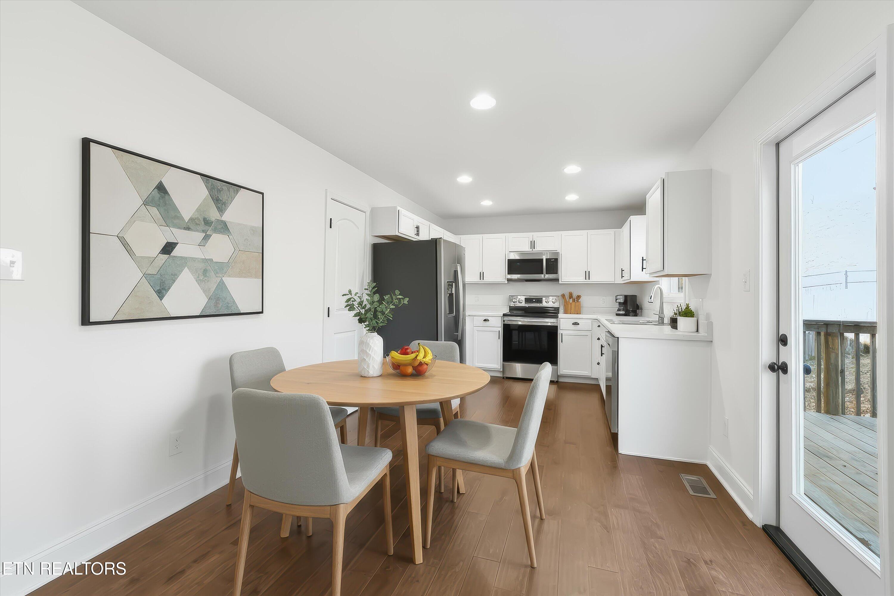 8000 Poplar Grove Lane Powell, TN 37849 - Photo 6 of 34 Dining Virtually Staged