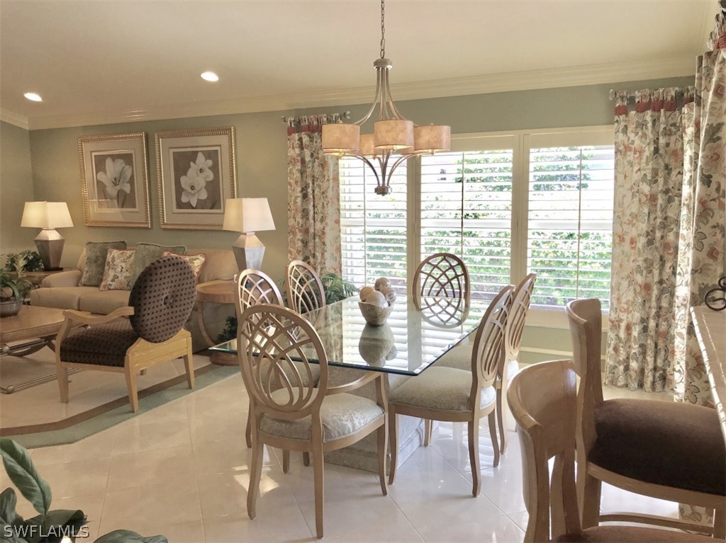 9324 Springview Loop Estero, FL 33928 - Photo 8 of 24 a view of a dining room with furniture window and outside view