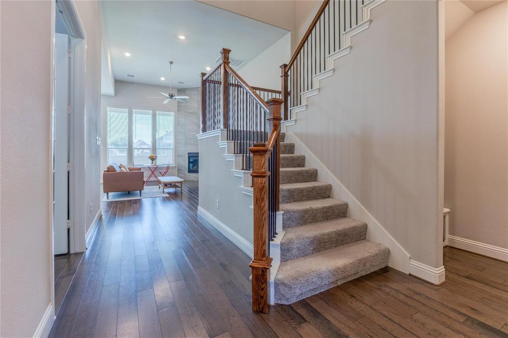 3920 Bentgrass Road Plano, TX 75023 - Photo 7 of 30 a view of entryway and hall with wooden floor