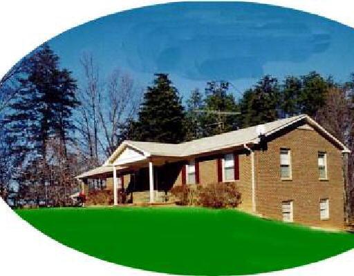 1620 Armstrong Road Penhook, VA 24137 - Photo 1 of 1 a front view of a house with a yard