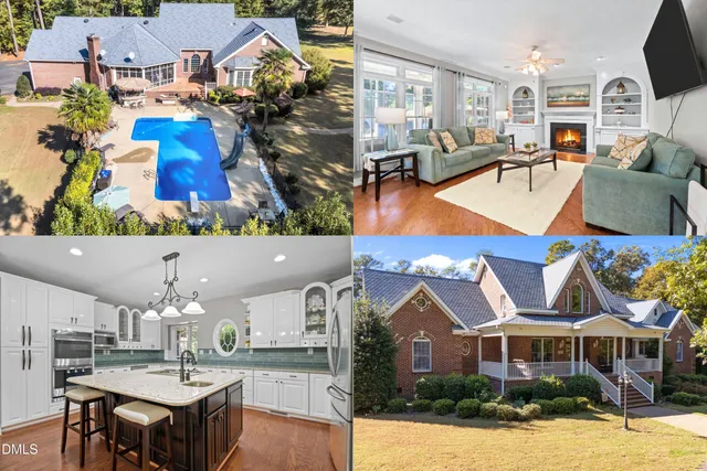 an aerial view of a house with swimming pool and seating space