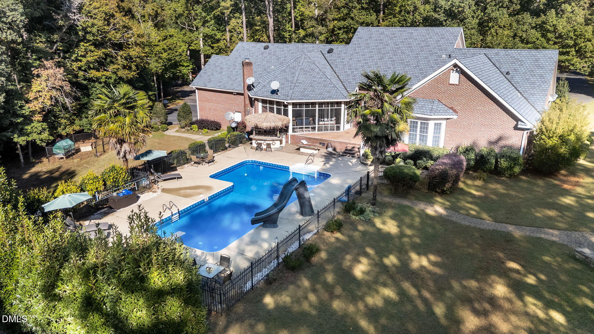 5870 Hoyt Road Middlesex, NC 27557 - Photo 25 of 33 a aerial view of a house with swimming pool and sitting area