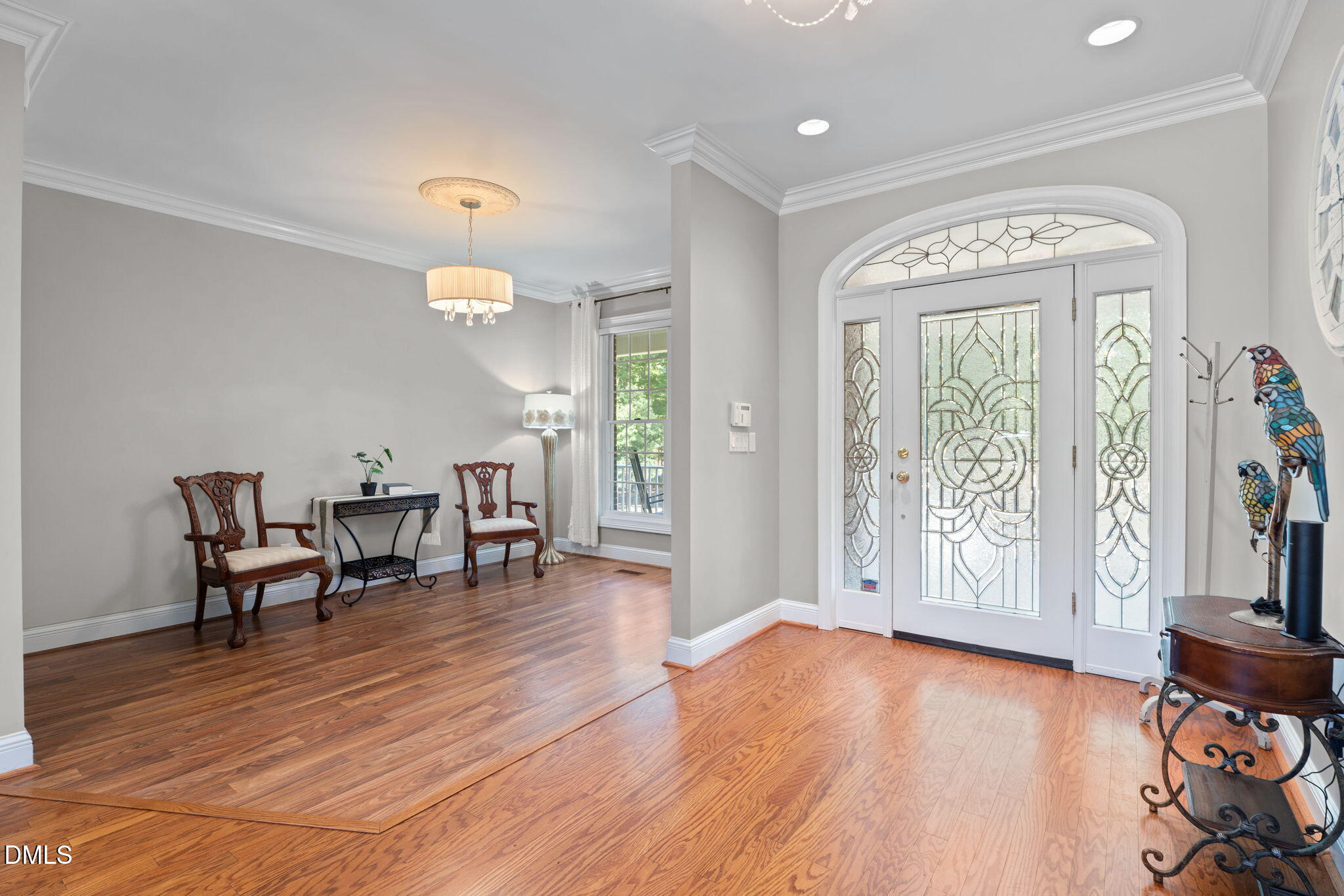 5870 Hoyt Road Middlesex, NC 27557 - Photo 9 of 33 a view of a livingroom with furniture and floor to ceiling windows
