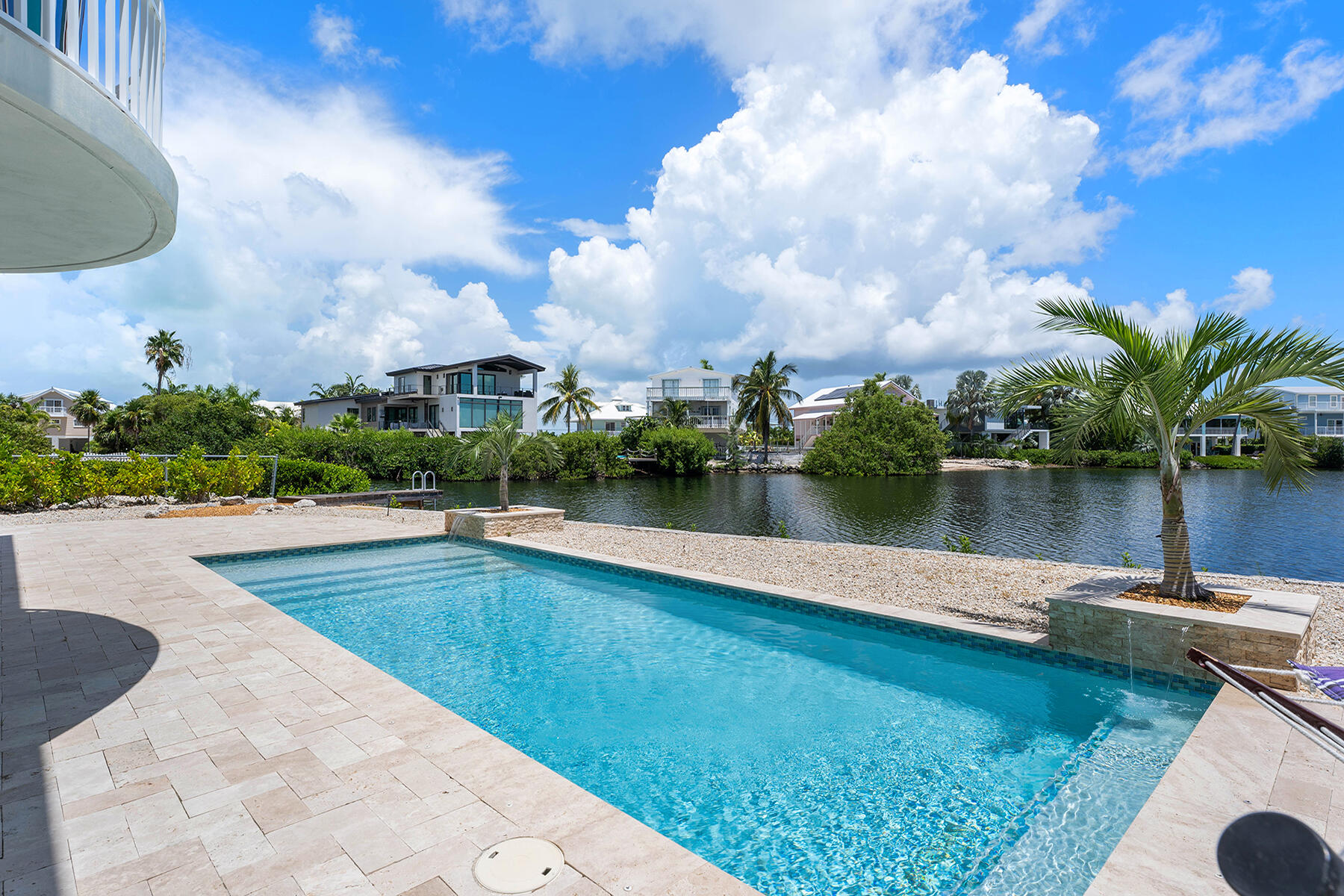 78 North Bounty Lane Key Largo, FL 33037 - Photo 11 of 68 Wrap around pool deck with hammocks