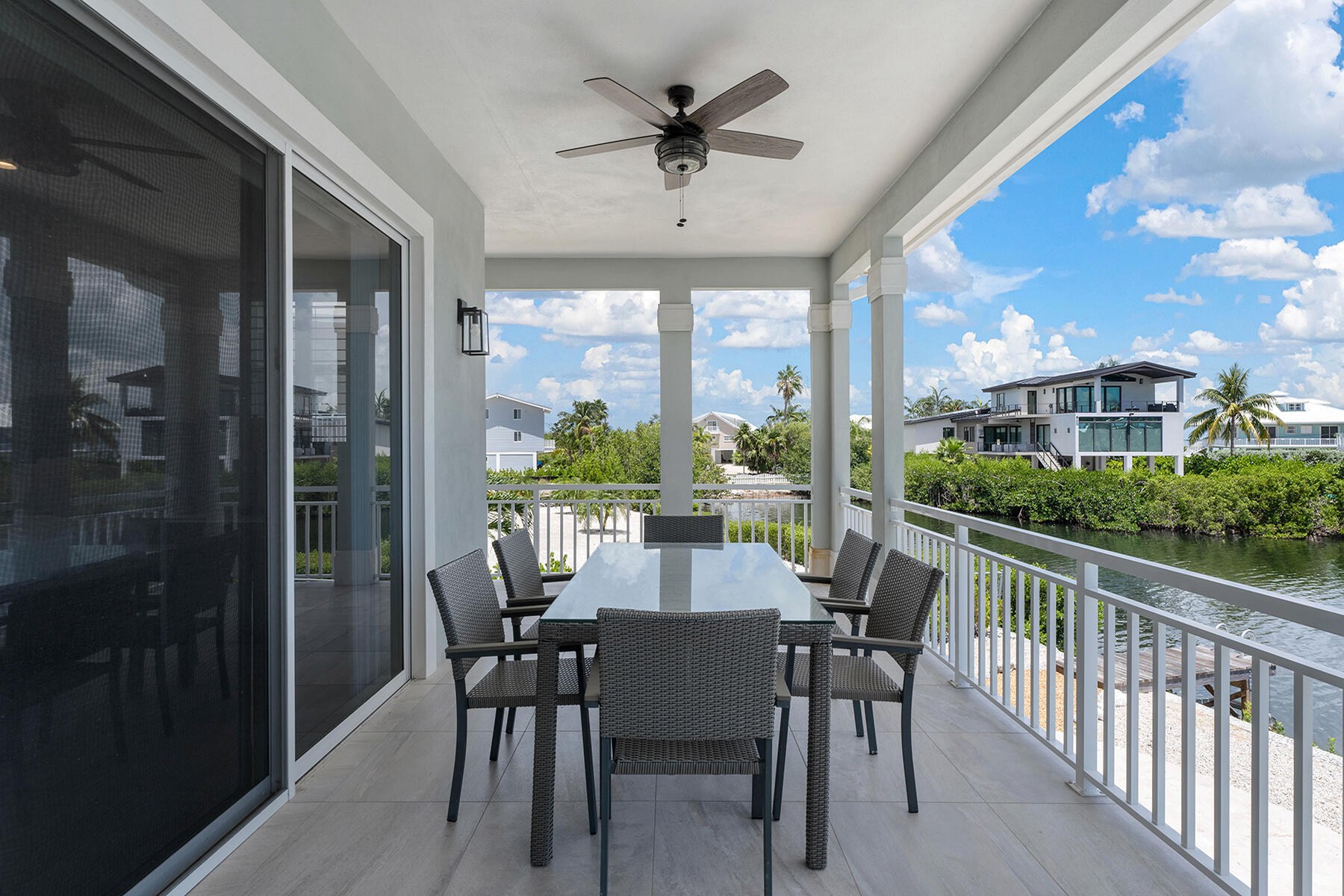 78 North Bounty Lane Key Largo, FL 33037 - Photo 31 of 68 a view of a dining room with furniture window and outside view