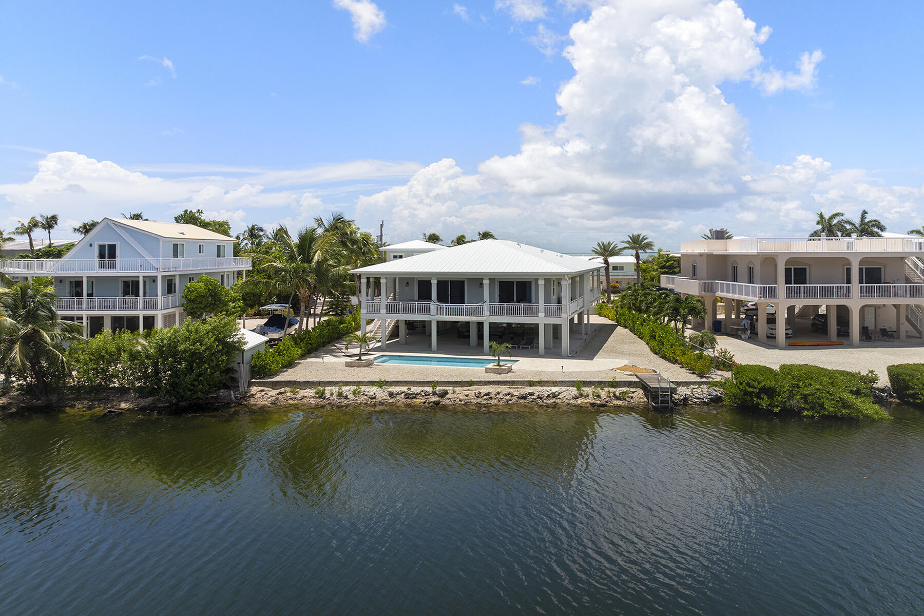 78 North Bounty Lane Key Largo, FL 33037 - Photo 49 of 68 Beautiful rock wall on the lake