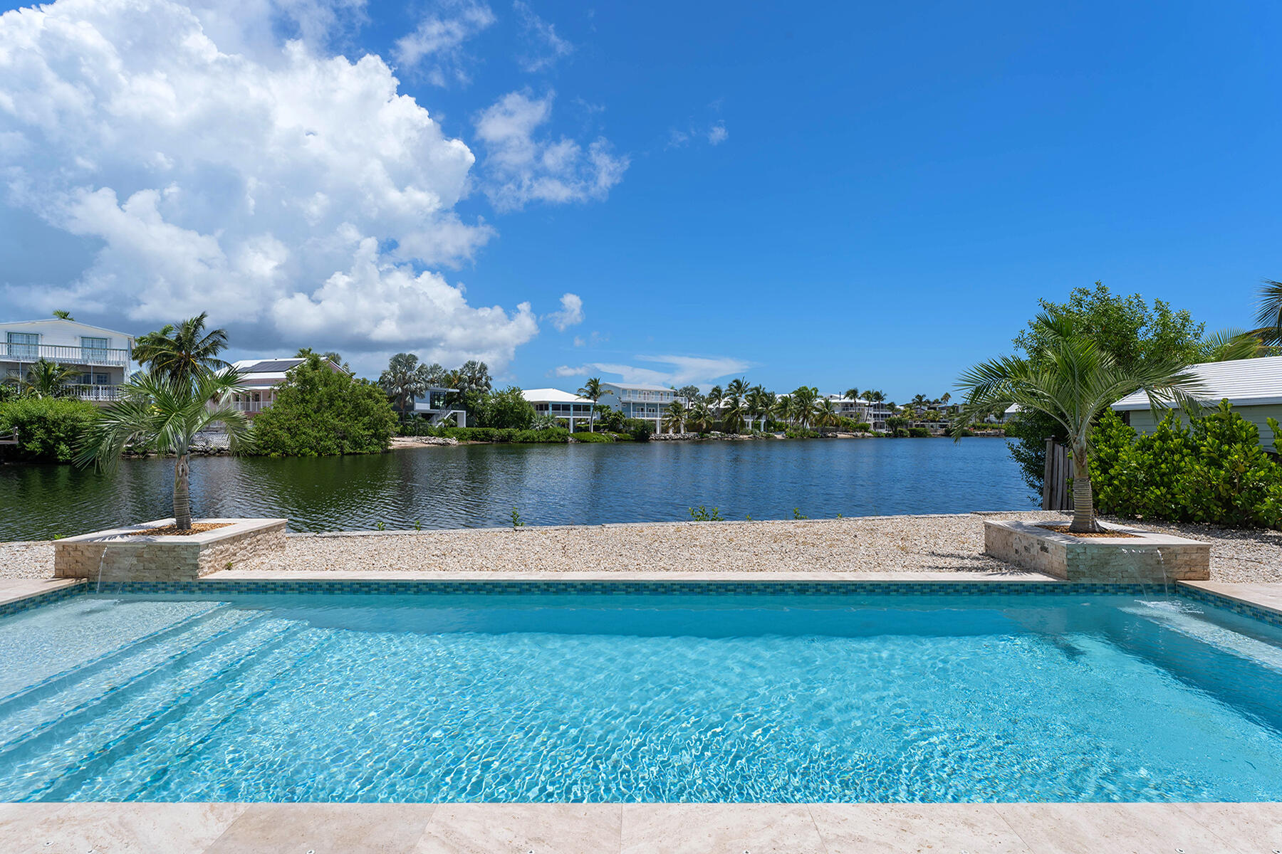 78 North Bounty Lane Key Largo, FL 33037 - Photo 7 of 68 a view of a lake with houses in the background