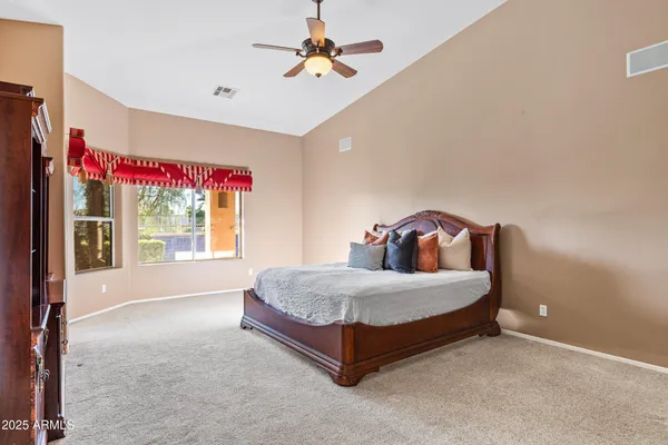 a view of a hallway with wooden shelves