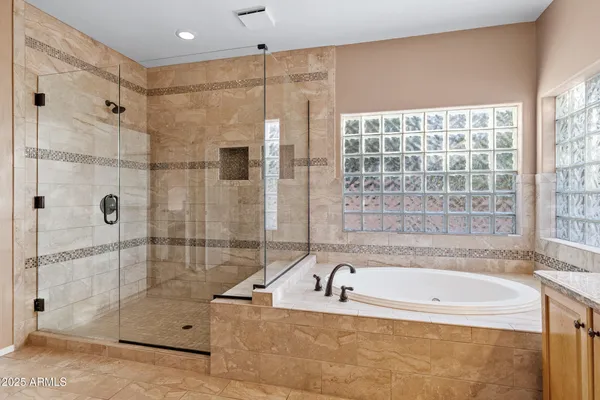 a kitchen with a sink and a refrigerator