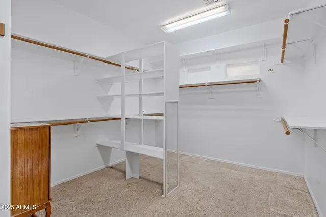 a view of a bathroom from a corridor