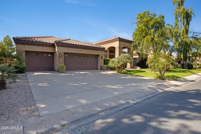 a view of a hallway with front door and windows