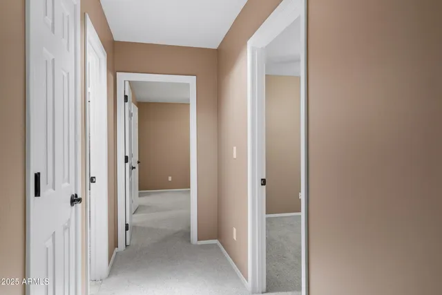 a view of a house with pool and chairs