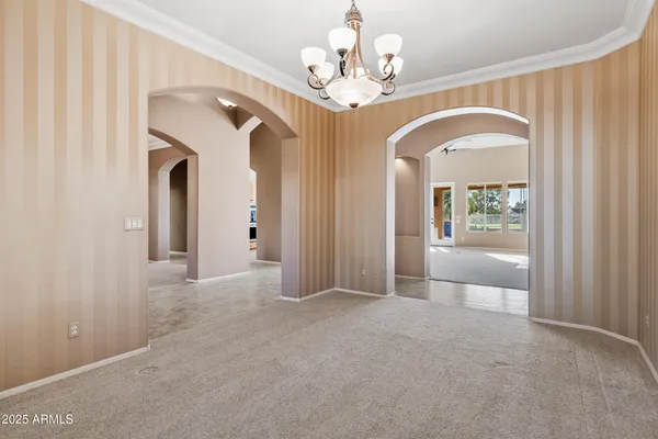 a view of an empty room with a fireplace