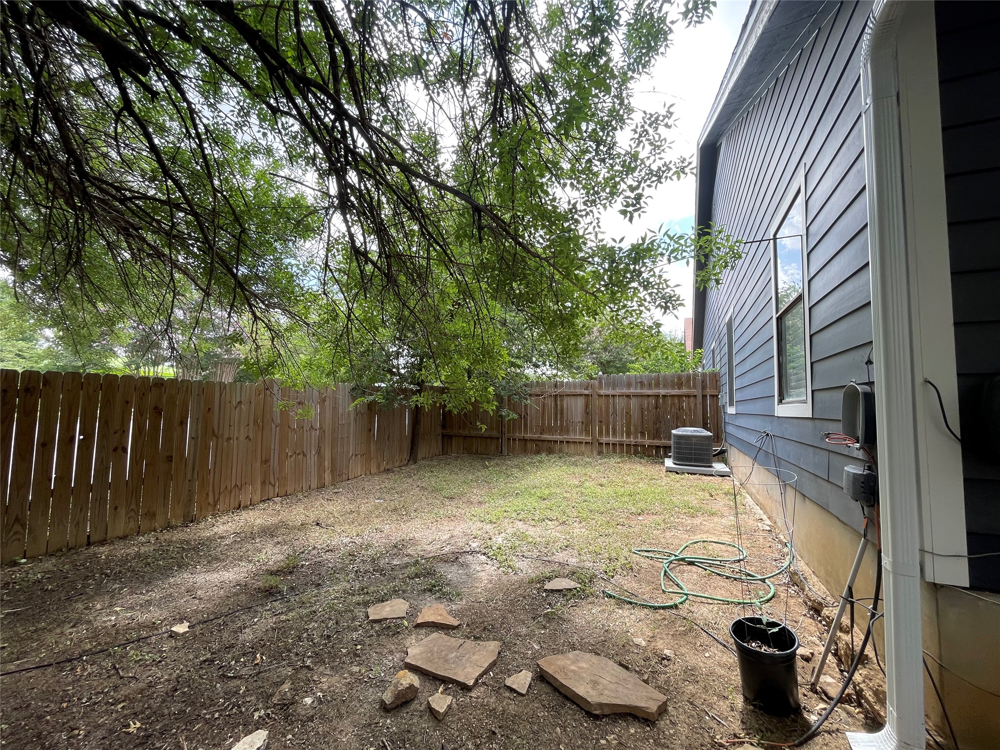 2031 Redwing Way Round Rock, TX 78664 - Photo 21 of 25 Secure backyard offers ample space for outdoor enjoyment and relaxation.