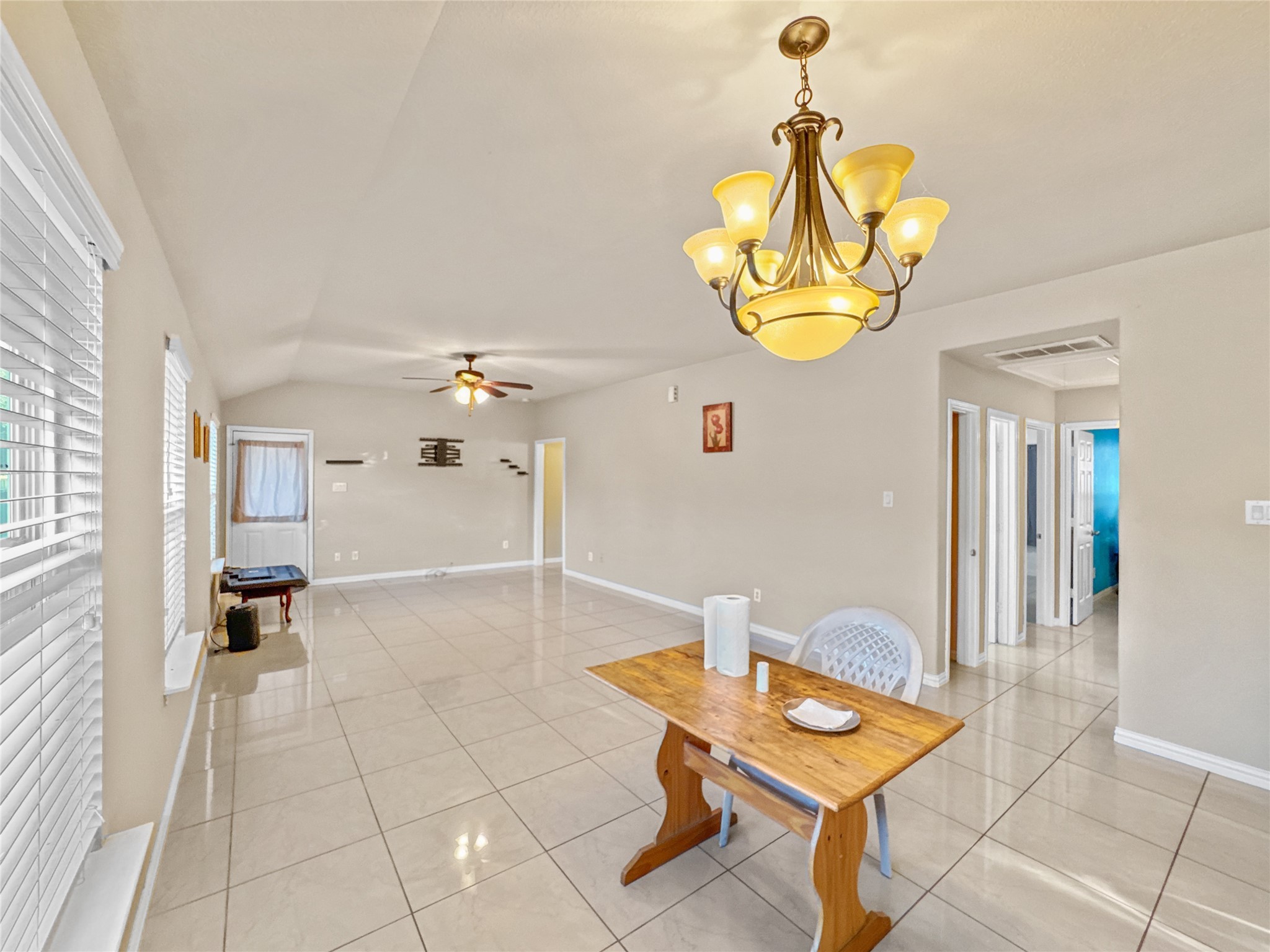 6614 Pine Tree Springs Houston, TX 77049 - Photo 4 of 14 a room with table and chairs