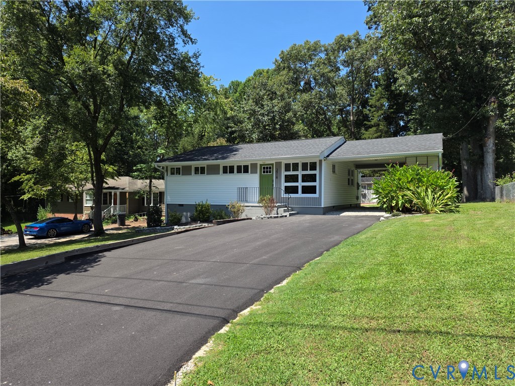 3918 Wood Dale Road Chester, VA 23831 - Photo 2 of 28 a view of a house with a yard