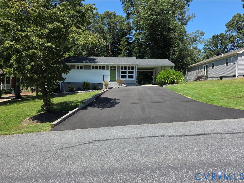 3918 Wood Dale Road Chester, VA 23831 - Photo 3 of 28 a front view of house with yard and green space