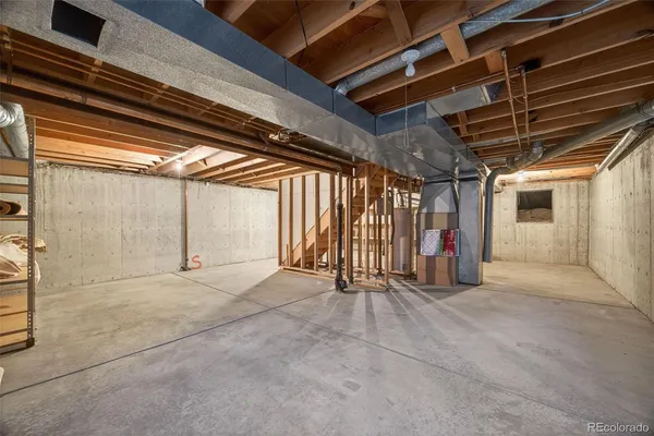 a room with lots of furniture and windows