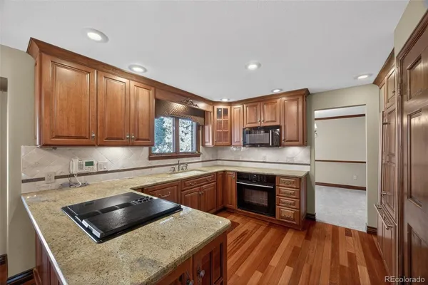 a dining room with wooden floor