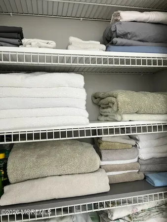 a view of a couch sitting in a shelf
