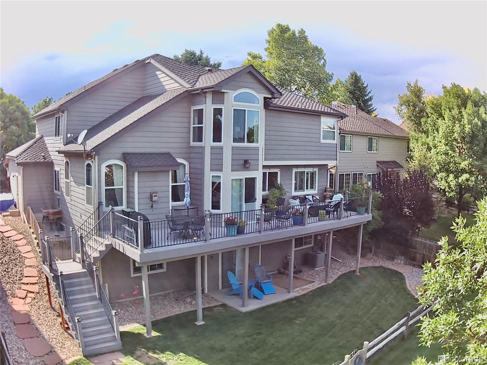 9538 La Quinta Drive Lone Tree, CO 80124 - Photo 34 of 41 front view of a house with a yard