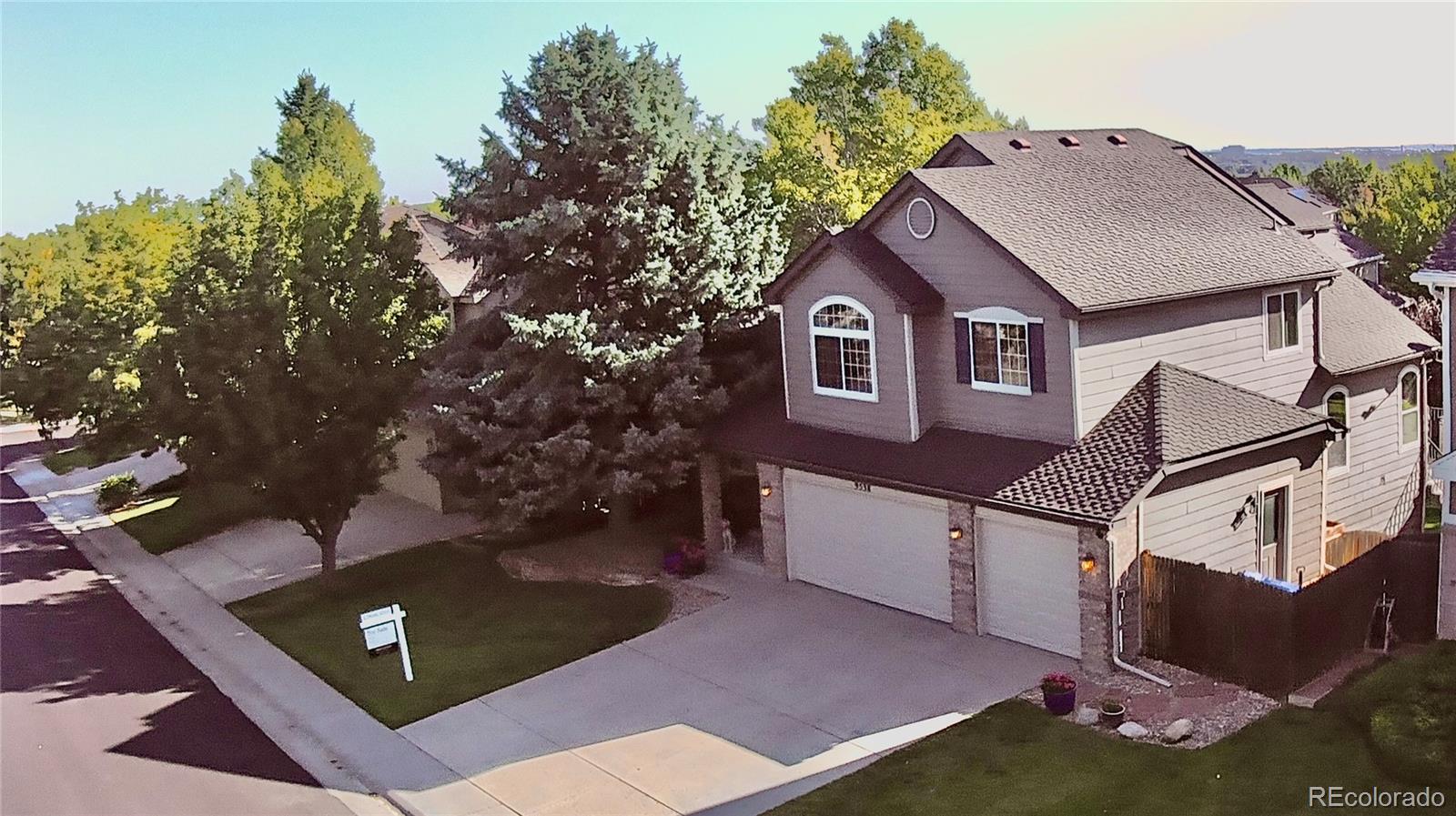 9538 La Quinta Drive Lone Tree, CO 80124 - Photo 40 of 41 a view of house with yard in front of it