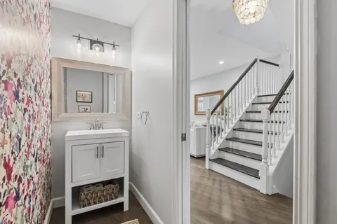 a view of entryway with stairs and furniture