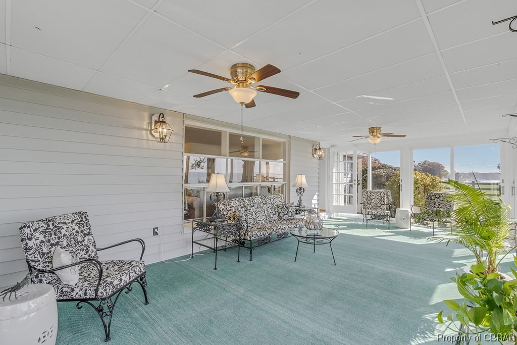 1057 Monaskon Road Lancaster, VA 22503 - Photo 11 of 43 View of patio / terrace with an outdoor hangout area and ceiling fan