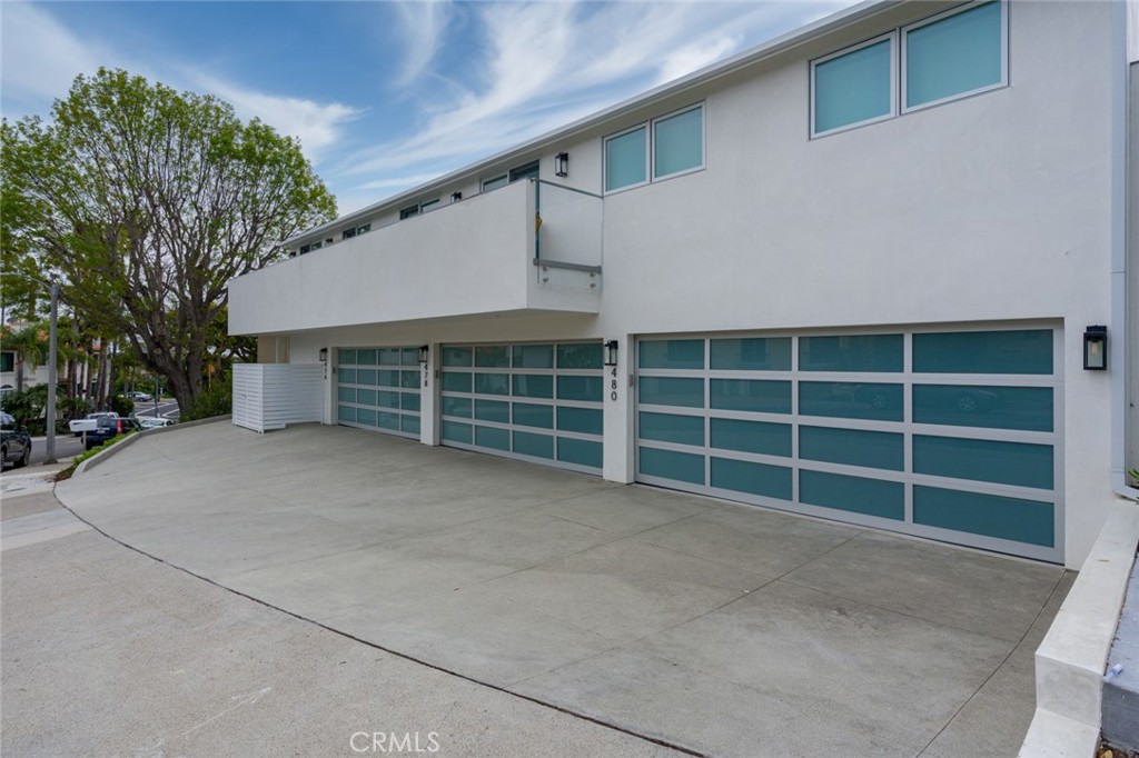 480 Morning Canyon Road Corona del Mar, CA 92625 - Photo 30 of 33 a view of a house with a yard and garage