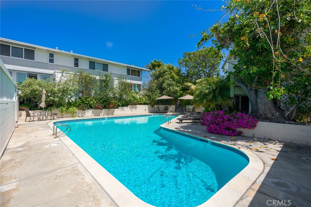 480 Morning Canyon Road Corona del Mar, CA 92625 - Photo 31 of 33 a view of a swimming pool with a patio