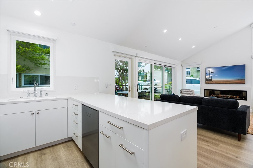 480 Morning Canyon Road Corona del Mar, CA 92625 - Photo 8 of 33 a kitchen with a sink and large window