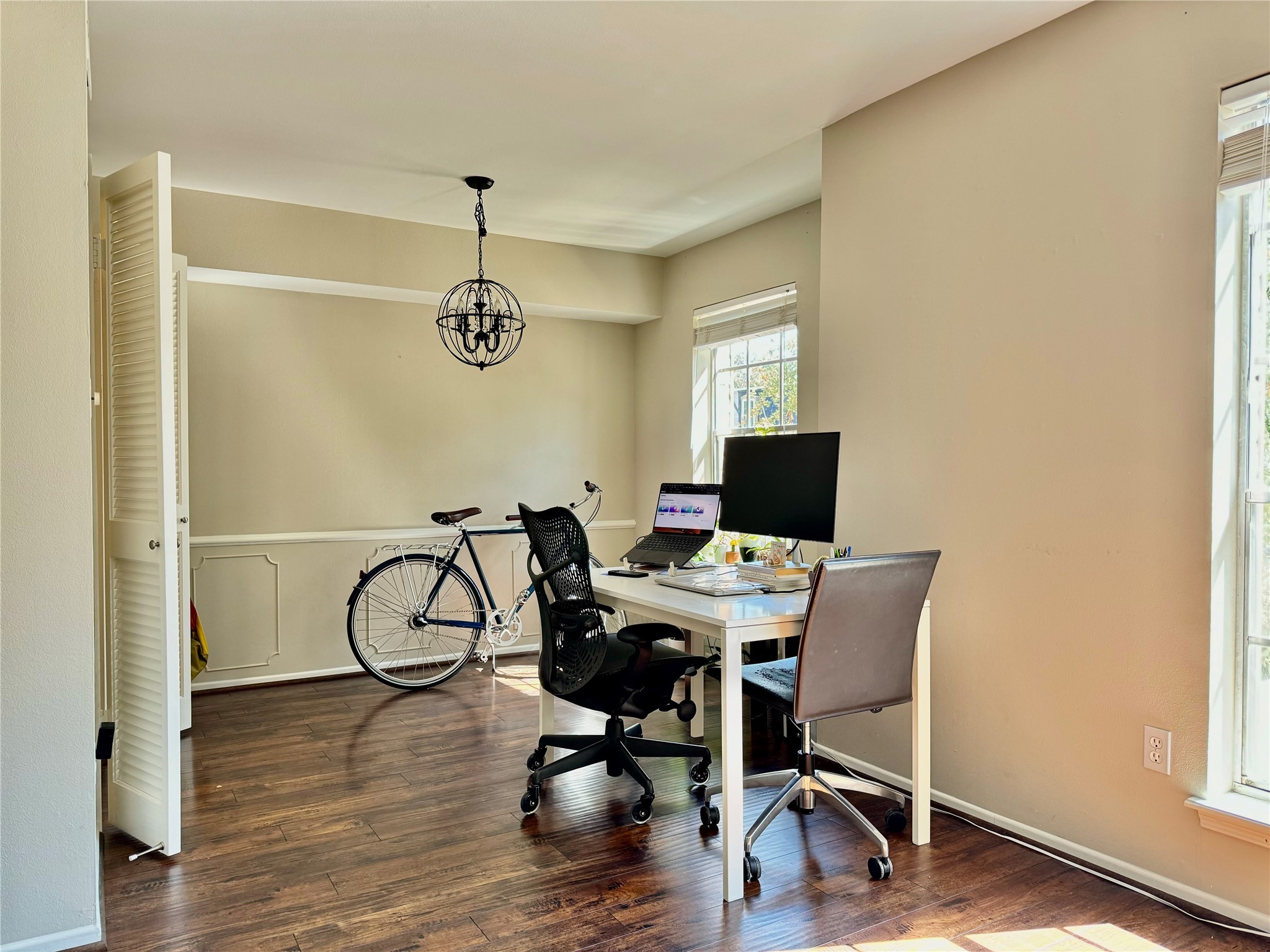 357 North Post Oak Lane, Unit 209 Houston, TX 77024 - Photo 9 of 20 a work room with furniture and wooden floor