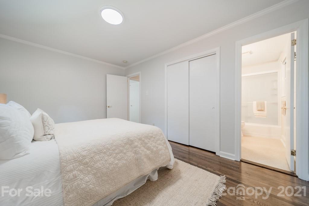 5330 Valley Forge Road Charlotte, NC 28210 - Photo 18 of 27 a bedroom with a bed and a window