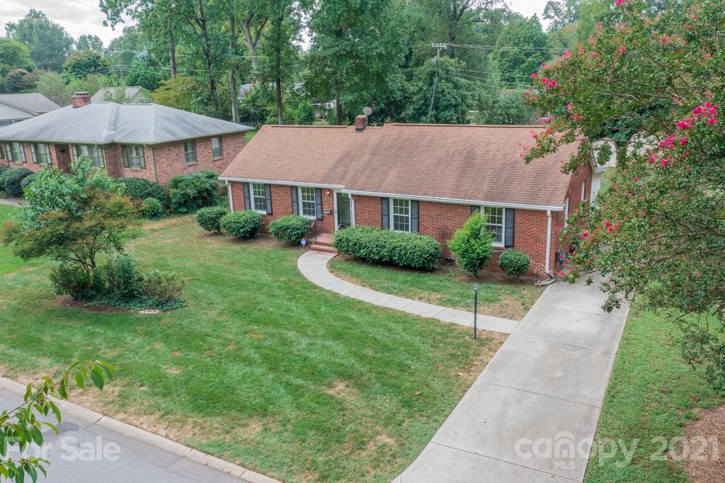 5330 Valley Forge Road Charlotte, NC 28210 - Photo 3 of 27 a aerial view of a house next to a big yard and large trees