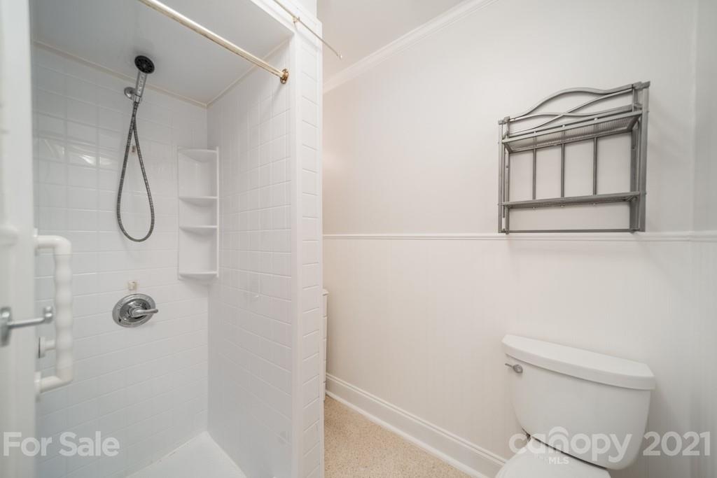 5330 Valley Forge Road Charlotte, NC 28210 - Photo 22 of 27 a bathroom with a shower a toilet and a shower