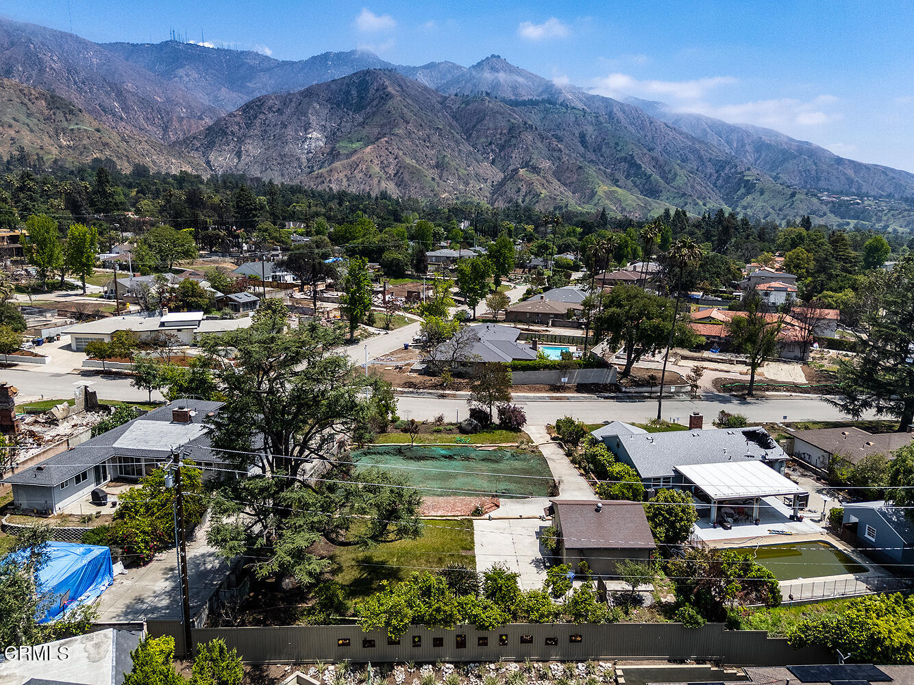 2221 Sinaloa Avenue Altadena, CA 91001 - Photo 7 of 22 an aerial view of a city with lots of residential buildings and mountain view in back