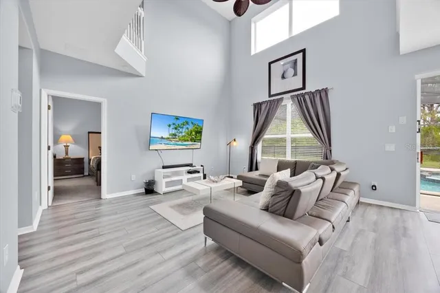 a living room with furniture and a window